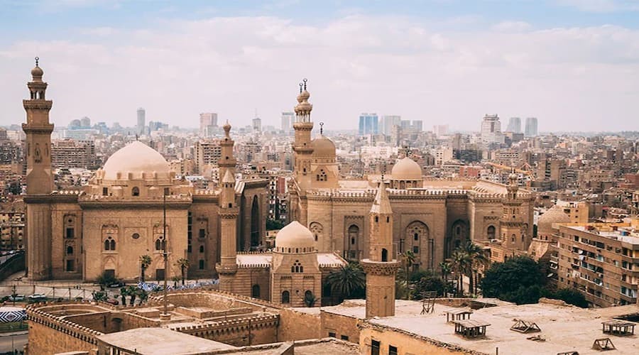 Collage of Cairo’s historical sites including the Pyramids of Giza, Cairo Citadel, and the Mosque of Muhammad Ali